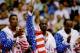 6 OCT 1992: USA BASKETBALL TEAM MEMBERS MICHAEL JORDAN (MIDDLE) SCOTTIE PIPPEN (LEFT) AND CLIDE DREXLER (RIGHT) ACKNOWLEDGE THE CROWD AFTER RECEIVING THEIR GOLD MEDALAS MEMBERS OF THE DREAM TEAM DURING THE 1992 BARCELONA OLYMPICS IN BARCELONA, SPAIN. Man