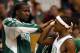 BOSTON - DECEMBER 03: Kendrick Perkins #43 of the Boston Celtics congratulates teammate Rajon Rondo #9 after Rondo was pulled from the game late in the fourth quarter against the Indiana Pacers on December 3, 2008 at TD Banknorth Garden in Boston, Massachusetts. The Celtics defeated the Pacers 114-96. NOTE TO USER: User expressly acknowledges and agrees that, by downloading and or using this Photograph, user is consenting to the terms and conditions of the Getty Images License Agreement. (Photo by Elsa/Getty Images)
