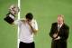 High emotion for Roger Federer receiving the Australian Open trophy from Rod "Rocket" Laver
