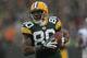 GREEN BAY, WI - JANUARY 01: Donald Driver #80 of the Green Bay Packers reacts as he scores a touchdown against the Detroit Lions at Lambeau Field on January 1, 2012 in Green Bay, Wisconsin. The Packers defeated the Lions 45-41. (Photo by Jonathan Daniel/Getty Images)