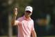 SILVIS, IL - JULY 15: Zach Johnson holds up his ball on the 17th green during the final round of the John Deere Classic held at TPC Deere Run on July 15, 2012 in Silvis, Illinois. (Photo by Michael Cohen/Getty Images)
