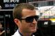 Kasey Kahne smiles in garage at Charlotte Motor Speedway. Credit: David Yeazell