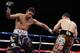 LAS VEGAS, NV - JULY 14: Danny Garcia lands a left hand knocking down Amir Khan of Great Britain during their WBC/ WBA Super Lightweight and vacant Ring Magazine Junior Welterweight title fight at Mandalay Bay Events Center on July 14, 2012 in Las Vegas, Nevada. (Photo by Jeff Gross/Getty Images)