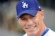 LOS ANGELES - AUGUST 20: WWE Superstar John Cena smiles before throwing out the first pitch before the game between the Chicago Cubs and the Los Angeles Dodgers at Dodger Stadium on August 20, 2009 in Los Angeles, California. (Photo by Harry How/Getty Images)