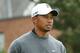 LYTHAM ST ANNES, ENGLAND - JULY 16: Tiger Woods of the United States walks with his manager Mark Steinberg during the first practice round prior to the start of the 141st Open Championship at Royal Lytham & St Annes on July 16, 2012 in Lytham St Annes, England. (Photo by Andrew Redington/Getty Images)