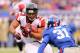 EAST RUTHERFORD, NJ - JANUARY 08: Michael Turner #33 of the Atlanta Falcons runs the ball against Aaron Ross #31 of the New York Giants during their NFC Wild Card Playoff game at MetLife Stadium on January 8, 2012 in East Rutherford, New Jersey. (Photo by Al Bello/Getty Images)