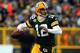 GREEN BAY, WI - JANUARY 15: Aaron Rodgers #12 of the Green Bay Packers looks to pass against the New York Giants during their NFC Divisional playoff game at Lambeau Field on January 15, 2012 in Green Bay, Wisconsin. (Photo by Jonathan Daniel/Getty Images)