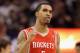 PHOENIX, AZ - FEBRUARY 09: Courtney Lee #5 of the Houston Rockets celebrates during the NBA game against the Phoenix Suns at US Airways Center on February 9, 2012 in Phoenix, Arizona. The Rockets defeated the Suns 96-89. NOTE TO USER: User expressly acknowledges and agrees that, by downloading and or using this photograph, User is consenting to the terms and conditions of the Getty Images License Agreement. (Photo by Christian Petersen/Getty Images)