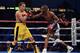 CARSON, CA - JULY 07: Jeffery Mathebula of South Africa punches Nonito Donaire of The Phillipines during the WBO IBF Super Bantamweight title fight at The Home Depot Center on July 7, 2012 in Carson, California. Donaire would win in a unanimous decision. (Photo by Harry How/Getty Images)