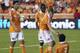 HOUSTON, TX - JULY 15: Andre Hainault #31 of the Houston Dynamo helps up Calen Carr #3 after he was taken down in the penalty area against the D.C. United at BBVA Compass Stadium on July 15, 2012 in Houston, Texas. Houston won 4-0. (Photo by Bob Levey/Getty Images)