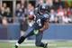 SEATTLE - DECEMBER 24: Running back Marshawn Lynch #24 of the Seattle Seahawks rushes against the San Francisco 49ers at CenturyLink Field on December 24, 2011 in Seattle, Washington. (Photo by Otto Greule Jr/Getty Images)