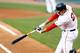 BOSTON, MA - JULY 17: Adrian Gonzalez #28 of the Boston Red Sox hits an RBI single against the Chicago White Sox in the first inning during the game on July 17, 2012 at Fenway Park in Boston, Massachusetts. (Photo by Jared Wickerham/Getty Images)