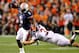 AUBURN, AL - NOVEMBER 26: Michael Dyer #5 of the Auburn Tigers is tackled by Vinnie Sunseri #3 of the Alabama Crimson Tide at Jordan-Hare Stadium on November 26, 2011 in Auburn, Alabama. (Photo by Kevin C. Cox/Getty Images)