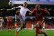 LIVERPOOL, ENGLAND - MAY 01: Martin Skrtel of Liverpool competes with Clint Dempsey of Fulham during the Barclays Premier League match between Liverpool and Fulham at Anfield on May 1, 2012 in Liverpool, England. (Photo by Clive Brunskill/Getty Images)
