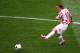 POZNAN, POLAND - JUNE 14: Luka Modric of Croatia passes the ball during the UEFA EURO 2012 group C match between Italy and Croatia at The Municipal Stadium on June 14, 2012 in Poznan, Poland. (Photo by Christof Koepsel/Getty Images)