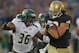 SOUTH BEND, IN - SEPTEMBER 03: Tyler Eifert #80 of the Notre Dame Fighting Irish is pursued by Sam Barrington #36 of the University of South Florida Bulls at Notre Dame Stadium on September 3, 2011 in South Bend, Indiana. (Photo by Jonathan Daniel/Getty Images)