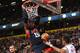 MANCHESTER, ENGLAND - JULY 19: USA player Carmelo Anthony scores a basket during the Men's Exhibition Game between USA and Team GB at Manchester Arena on July 19, 2012 in Manchester, England. (Photo by Stu Forster/Getty Images)