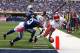 Oct 9, 2011; Indianapolis, IN, USA; Kansas City Chiefs wide receiver Steve Breaston (15) catches the ball and dives in for a touchdown at the pylon as Indianapolis Colts defensive back Terrence Johnson (23) defends at Lucas Oil Stadium. Mandatory Credit: Brian Spurlock-US PRESSWIRE