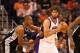 PHOENIX, AZ - MARCH 27: Robin Lopez #15 of the Phoenix Suns handles the ball during the NBA game against the San Antonio Spurs at US Airways Center on March 27, 2012 in Phoenix, Arizona. The Spurs defeated the Suns 107-100. NOTE TO USER: User expressly acknowledges and agrees that, by downloading and or using this photograph, User is consenting to the terms and conditions of the Getty Images License Agreement. (Photo by Christian Petersen/Getty Images)