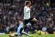 MANCHESTER, ENGLAND - JANUARY 22: Luka Modric of Tottenham Hotspur is challenged by David Silva of Manchester City during the Barclays Premier League match between Manchester City and Tottenham Hotspur at the Etihad Stadium on January 22, 2012 in Manchester, England. (Photo by Alex Livesey/Getty Images)