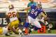 TORONTO, ON - OCTOBER 30: Scott Chandler #84 of the Buffalo Bills scores a touchdown in the first quarter against the Washington Redskins at Rogers Centre on October 30, 2011 in Toronto, Ontario. (Photo by Rick Stewart/Getty Images)