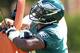 PHILADELPHIA, PA - MAY 12: D.J. Jones #74 of the Philadelphia Eagles hits the blocking sled during rookie mini-camp at their practice facility on May 12, 2012 in Philadelphia, Pennsylvania. (Photo by Rich Schultz /Getty Images)