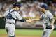 PHOENIX, AZ - JULY 04: Pitcher Huston Street #16 of the San Diego Padres is congratulated by catcher Yasmani Grandal following an 8-6 victory over the Arizona Diamondbacks in a MLB game at Chase Field on July 4, 2012 in Phoenix, Arizona. (Photo by Ralph Freso/Getty Images)