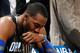 ATLANTA, GA - APRIL 28: Dwight Howard #12 of the Orlando Magic sits on the bench during a timeout before the final seconds against the Atlanta Hawks during Game Six of the Eastern Conference Quarterfinals in the 2011 NBA Playoffs at Philips Arena on April 28, 2011 in Atlanta, Georgia. NOTE TO USER: User expressly acknowledges and agrees that, by downloading and or using this photograph, User is consenting to the terms and conditions of the Getty Images License Agreement. (Photo by Kevin C. Cox/Getty Images)