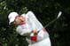 LYTHAM ST ANNES, ENGLAND - JULY 21: Adam Scott of Australia hits his tee shot on the first hole during the third round of the 141st Open Championship at Royal Lytham & St. Annes Golf Club on July 21, 2012 in Lytham St Annes, England. (Photo by Andrew Redington/Getty Images)