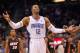 ORLANDO, FL - DECEMBER 21: Dwight Howard #12 of the Orlando Magic argues a call during a preseason game against the Miami Heat at Amway Center on December 21, 2011 in Orlando, Florida. NOTE TO USER: User expressly acknowledges and agrees that, by downloading and/or using this Photograph, User is consenting to the terms and conditions of the Getty Images License Agreement. (Photo by Mike Ehrmann/Getty Images)
