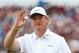 LYTHAM ST ANNES, ENGLAND - JULY 22: Ernie Els of South Africa waves to the gallery on the 15th green during the final round of the 141st Open Championship at Royal Lytham & St. Annes Golf Club on July 22, 2012 in Lytham St Annes, England. (Photo by Andrew Redington/Getty Images)