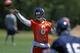 Cutler throws to Marshall at Bears mini camp.