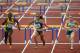 BEIJING - AUGUST 19: (L-R) Delloreen Ennis-London of Jamaica, Lolo Jones of the United States and Sally McLellan of Australia compete in the Women's 100m Hurdles Final held at the National Stadium on Day 11 of the Beijing 2008 Olympic Games on August 19, 2008 in Beijing, China. (Photo by Michael Steele/Getty Images)