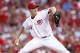 CINCINNATI, OH - JULY 15: Homer Bailey #34 of the Cincinnati Reds pitches during the game against the St. Louis Cardinals at Great American Ball Park on July 15, 2012 in Cincinnati, Ohio. (Photo by Joe Robbins/Getty Images)