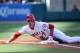 ANAHEIM, CA - JULY 22: Mike Trout #27 of the Los Angeles Angels of Anaheim is safe at third base after hitting a triple in the second inning against the Texas Rangers at Angel Stadium of Anaheim on July 22, 2012 in Anaheim, California. (Photo by Lisa Blumenfeld/Getty Images)