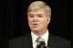 INDIANAPOLIS, IN - JULY 23: NCAA president Mark Emmert speaks during a press conference at the NCAA's headquarters to announce sanctions against Penn State University's football program on July 23, 2012 in Indianapolis, Indiana. The sanctions are a result of a report that the university concealed allegations of child sexual abuse made against former defensive coordinator Jerry Sandusky, who was found guilty on 45 of 48 counts related to sexual abuse of boys over a 15-year period. (Photo by Joe Robbins/Getty Images)