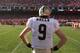 SAN FRANCISCO, CA - JANUARY 14: Quarterback Drew Brees #9 of the New Orleans Saints watch from the sidelines during the second quarter of the NFC Divisional playoff game against the San Francisco 49ers at Candlestick Park on January 14, 2012 in San Francisco, California. (Photo by Ezra Shaw/Getty Images)