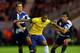 MIDDLESBROUGH, ENGLAND - JULY 20: Lucas of Brazil holds off Aaron Ramsey and Jack Cork of GB during the international friendly match between Team GB and Brazil at Riverside Stadium on July 20, 2012 in Middlesbrough, England. (Photo by Julian Finney/Getty Images)