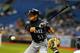 ST. PETERSBURG, FL - JULY 21: Outfielder Ichiro Suzuki #51 of the Seattle Mariners bats against the Tampa Bay Rays July 21, 2012 at Tropicana Field in St. Petersburg, Florida. (Photo by Al Messerschmidt/Getty Images)