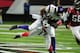 ATLANTA, GA - NOVEMBER 26: Visanthe Shiancoe #81 of the Minnesota Vikings runs with a catch against James Sanders #36 of the Atlanta Falcons at the Georgia Dome on November 26, 2011 in Atlanta, Georgia. (Photo by Scott Cunningham/Getty Images)