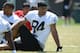 ALAMEDA, CA - MAY 12: Juron Criner #84 of the Oakland Raiders stretches during the Raiders Rookie Minicamp on May 12, 2012 at the Oakland Raiders Training Facility in Alameda, California. (Photo by Thearon W. Henderson/Getty Images)