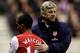 WOLVERHAMPTON, ENGLAND - APRIL 11: Arsenal manager Arsene Wenger with Theo Walcott during the Barclays Premier League match between Wolverhampton Wanderers and Arsenal at Molineux on April 11, 2012 in Wolverhampton, England. (Photo by Scott Heavey/Getty Images)