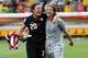 DRESDEN, GERMANY - JULY 10: Abby Wambach (L) and Hope Solo (R), goalkeeper of USA celebrate their victory after penalty shoot out during the FIFA Women's World Cup 2011 Quarter Final match between Brazil and USA at Rudolf-Harbig-Stadion on July 10, 2011 in Dresden, Germany. (Photo by Martin Rose/Getty Images)
