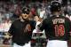 PHOENIX, AZ - JULY 21: Jason Kubel #13 and teammate Juston Upton #10 of the Arizona Diamondbacks celebrate a home run against the Houston Astros at Chase Field on July 21, 2012 in Phoenix, Arizona. (Photo by Norm Hall/Getty Images)