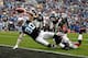 CHARLOTTE, NC - DECEMBER 24: Jeremy Shockey #80 of the Carolina Panthers dives for a touchdown against Ahmad Black #43 of the Tampa Bay Buccaneers during their game at Bank of America Stadium on December 24, 2011 in Charlotte, North Carolina. (Photo by Streeter Lecka/Getty Images)