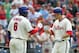PHILADELPHIA - JULY 21: Second baseman Chase Utley #26 of the Philadelphia Phillies is greeted by first baseman Ryan Howard #6 after hitting solo home run during a game against the San Francisco Giants at Citizens Bank Park on July 21, 2012 in Philadelphia, Pennsylvania. (Photo by Hunter Martin/Getty Images)