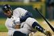 SEATTLE, WA - JULY 24: Alex Rodriguez #13 of the New York Yankees crumples to the ground after being hit with a pitch by starting pitcher Felix Hernandez of the Seattle Mariners at Safeco Field on July 24, 2012 in Seattle, Washington. Rodriguez was removed from the game. (Photo by Otto Greule Jr/Getty Images)