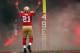 SAN FRANCISCO, CA - JANUARY 22: Running back Frank Gore #21 of the San Francisco 49ers runs onto the field during player introductions against the New York Giants during the NFC Championship Game at Candlestick Park on January 22, 2012 in San Francisco, California. (Photo by Ezra Shaw/Getty Images)