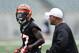 CINCINNATI, OH - MAY 12: Dre Kirkpatrick #27 of the Cincinnati Bengals talks with coach Hue Jackson during a rookie minicamp at Paul Brown Stadium on May 12, 2012 in Cincinnati, Ohio. (Photo by Joe Robbins/Getty Images)