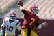 Apr 14, 2012; Los Angeles, CA, USA; Southern California Trojans quarterback Matt Barkley (7) is pressured by linebacker Hayes Pullard (10) in the 2012 spring game at the Los Angeles Memorial Coliseum. Mandatory Credit: Kirby Lee/Image of Sport-US PRESSWIRE